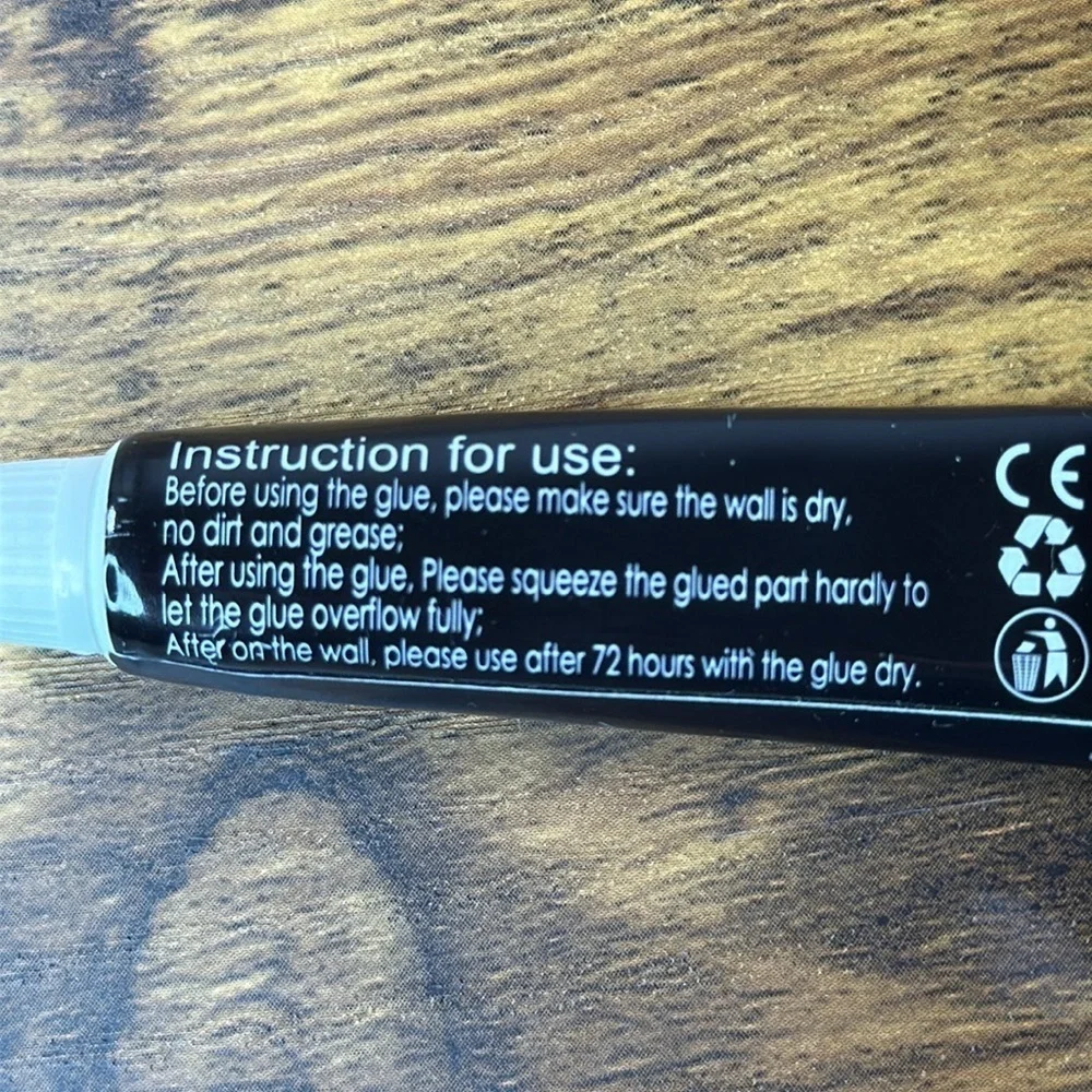 Black Nail Adhesive Tube